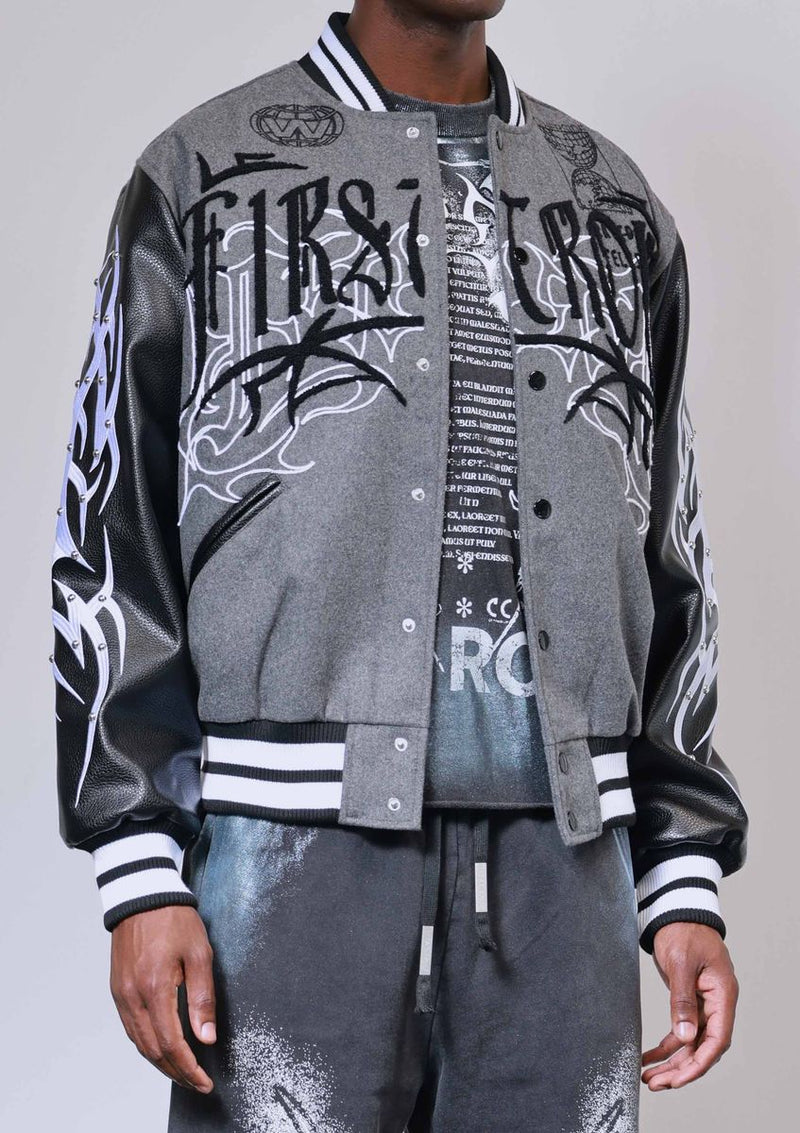 FIRST ROW Y2K TRIBAL VARSITY JACKET